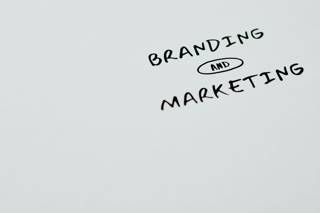 home-hero A minimalist image featuring the words 'Branding' and 'Marketing' on a white background, ideal for digital marketing themes.